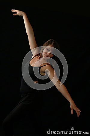 Beautiful Expressive Female Dancer with Arms Extended