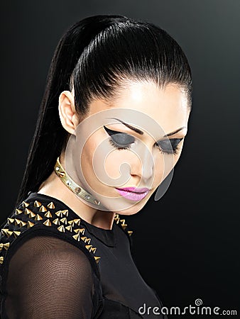 Beautiful face of fashion woman with bright makeup.