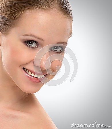 Beautiful face healthy young woman smiling