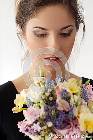 Beautiful girl with bouquet