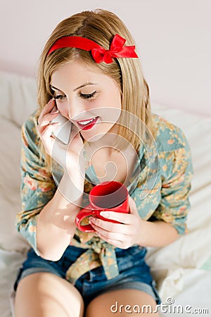 Beautiful girl cup of drink & mobile cell phone