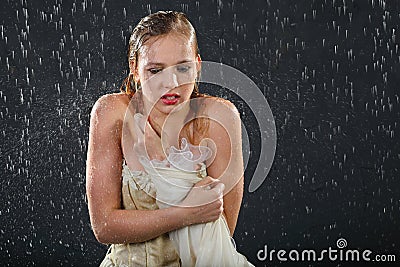 Beautiful girl freezes in rain