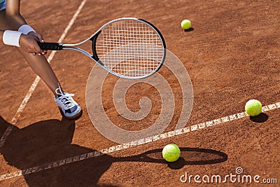 Beautiful girl playing tennis