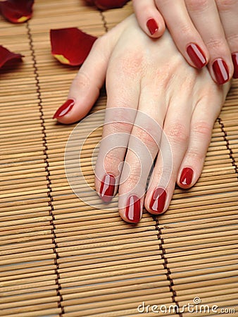 Beautiful hand with perfect nail red manicure