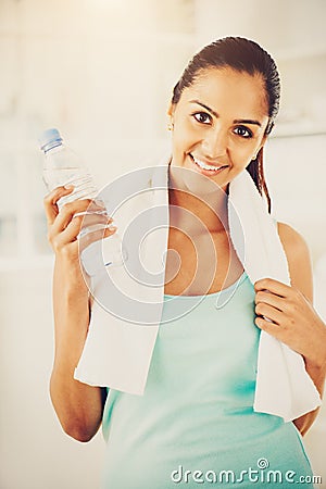 Beautiful Indian woman water bottle fitness healthy happy