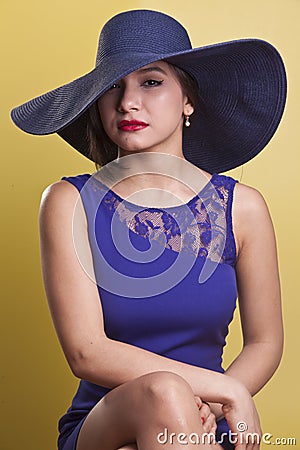 http://thumbs.dreamstime.com/x/beautiful-latina-model-blue-dress-24913790.jpg