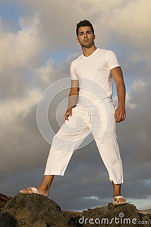 Beautiful man on the lava of a vulcan