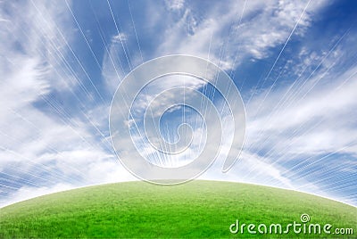 Beautiful meadow with sky and sun flare