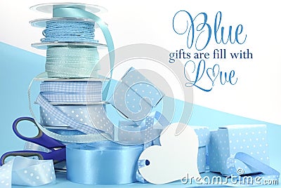 Beautiful pale aqua baby blue gift wrapping ribbons and gift boxes