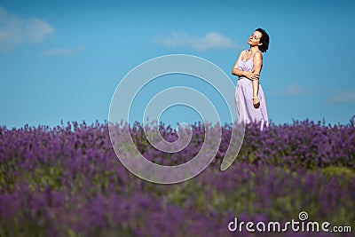 Beautiful provence woman in lavender field