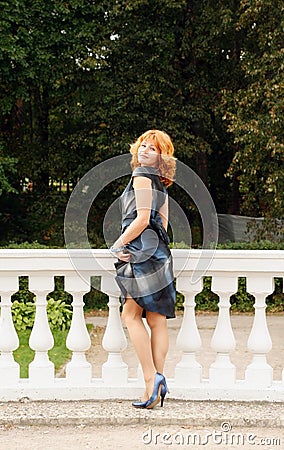 Girls  Dress on The Beautiful Red Girl In A Dark Blue Dress Stock Photography   Image