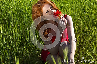 Beautiful red haired woman enjoying life