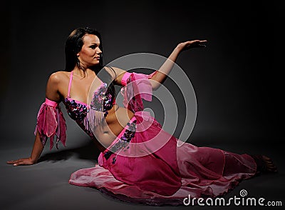 Beautiful sexy dancer woman in bellydance costume