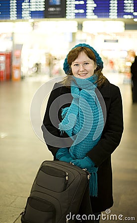 Beautiful smiling woman in airport