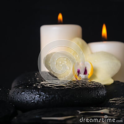 Beautiful spa setting of zen stones with drops closeup,