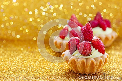Beautiful tiny cupcakes with wild strawberries