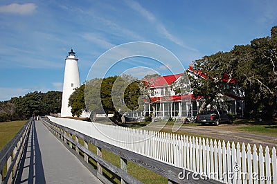 Beautiful white lighthouse, old oaks and a blue blue sky on the NC Island of Ocracoke