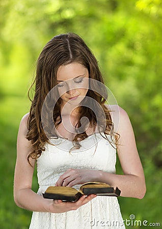 Beautiful woman with Bible