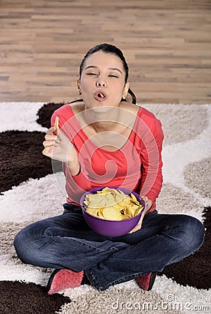 Beautiful woman eating junk food