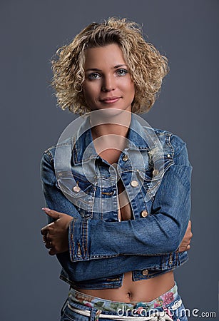 Beautiful woman in jeans and jacket