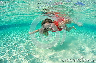 Beautiful woman lady in red swim dress water sea