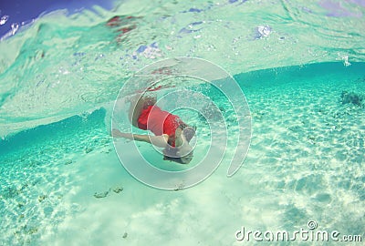 Beautiful woman lady in red swim dress water sea