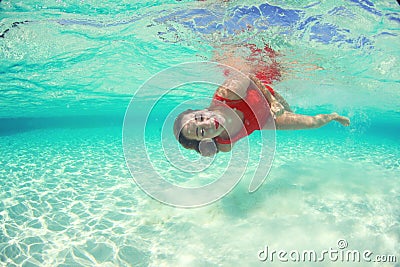 Beautiful woman lady in red swim dress water sea