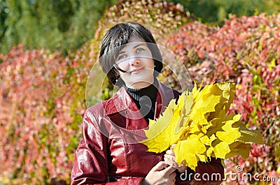 Beautiful woman with leaves