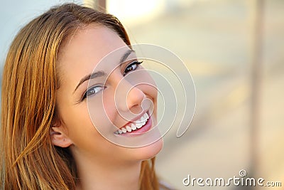 Beautiful woman with a perfect white smile and smooth skin