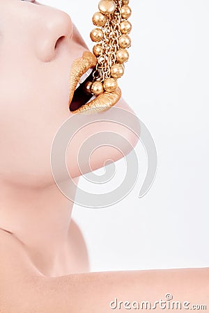 Beautiful Woman Profile with Gold Lips and Jewlery
