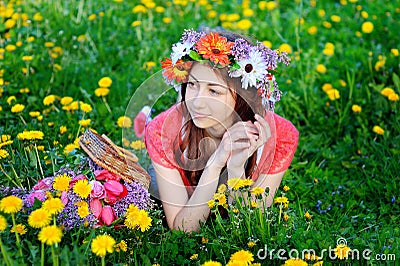 http://thumbs.dreamstime.com/x/beautiful-woman-red-dress-lying-meadow-yellow-flowers-spring-53942398.jpg