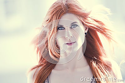 Beautiful woman with red hair