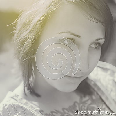 Beautiful woman with tattoo in vintage style