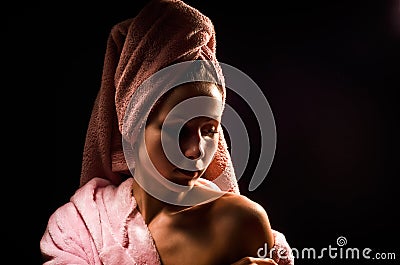 Beautiful woman with towel on head
