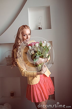 Beautiful woman with tulips