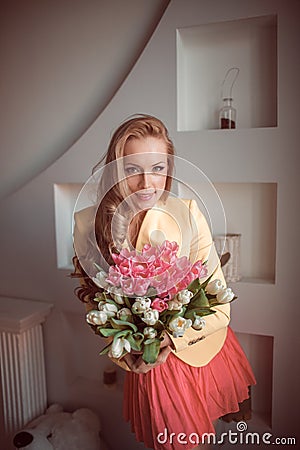 Beautiful woman with tulips