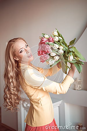 Beautiful woman with tulips