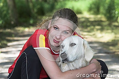 Beautiful woman; walking the dog