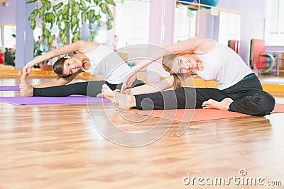 Beautiful Women Doing Fitness Exercise And Looking At Camera Stock ...