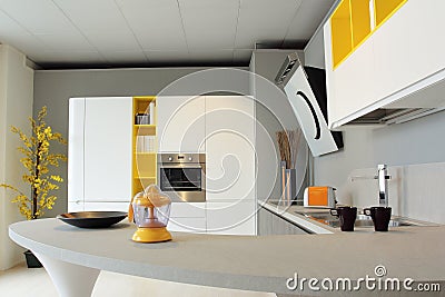 Beautiful yellow and white kitchen