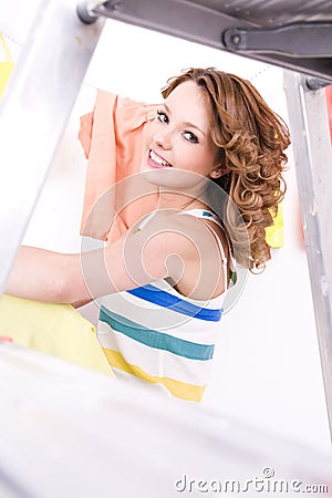 Beautiful young girl in colorful dressing room