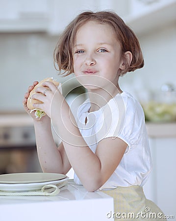 Beautiful Young Girl eating sandwich