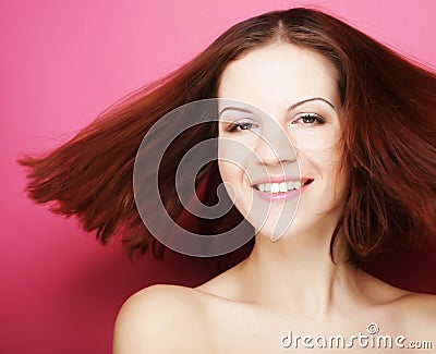 Beautiful young smiling woman with clean skin