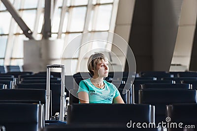 Beautiful young woman at the airport