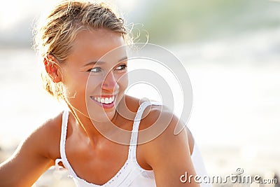 Beautiful young woman on the beach