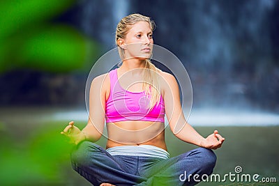 Beautiful Young Woman in Lotus Position