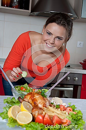 Beautiful young woman in modern kitchen