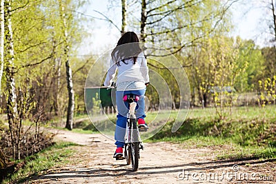 Beautiful young woman with mountain bicycle