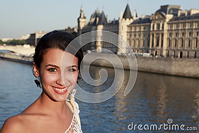 Beautiful young woman on a Paris Bridge