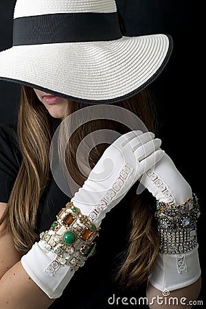 Beautiful Young Woman with Stylish Floppy Hat, Long Vintage White Gloves and Jewelry